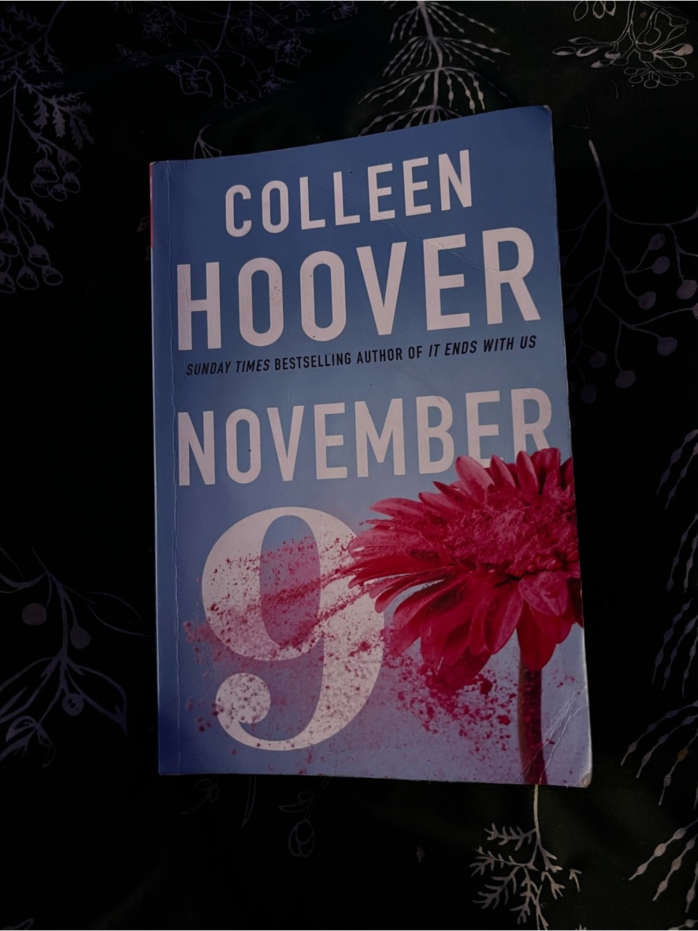 November 9 Paperback - Blue Cover with Pink Flower